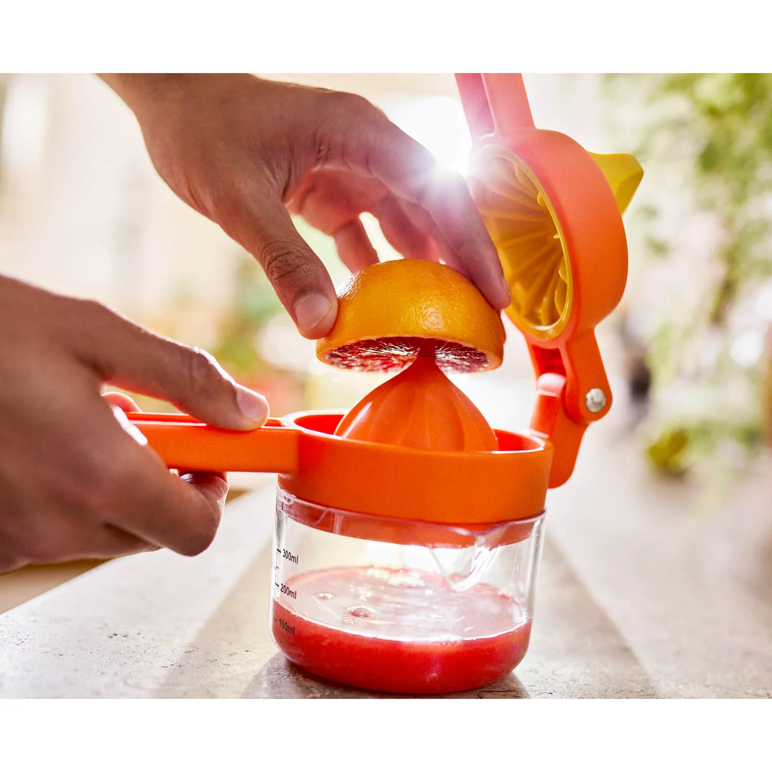 Joseph Joseph JuiceMax™ Dual-Action Citrus Press with Measuring Cup - Orange - Image 8