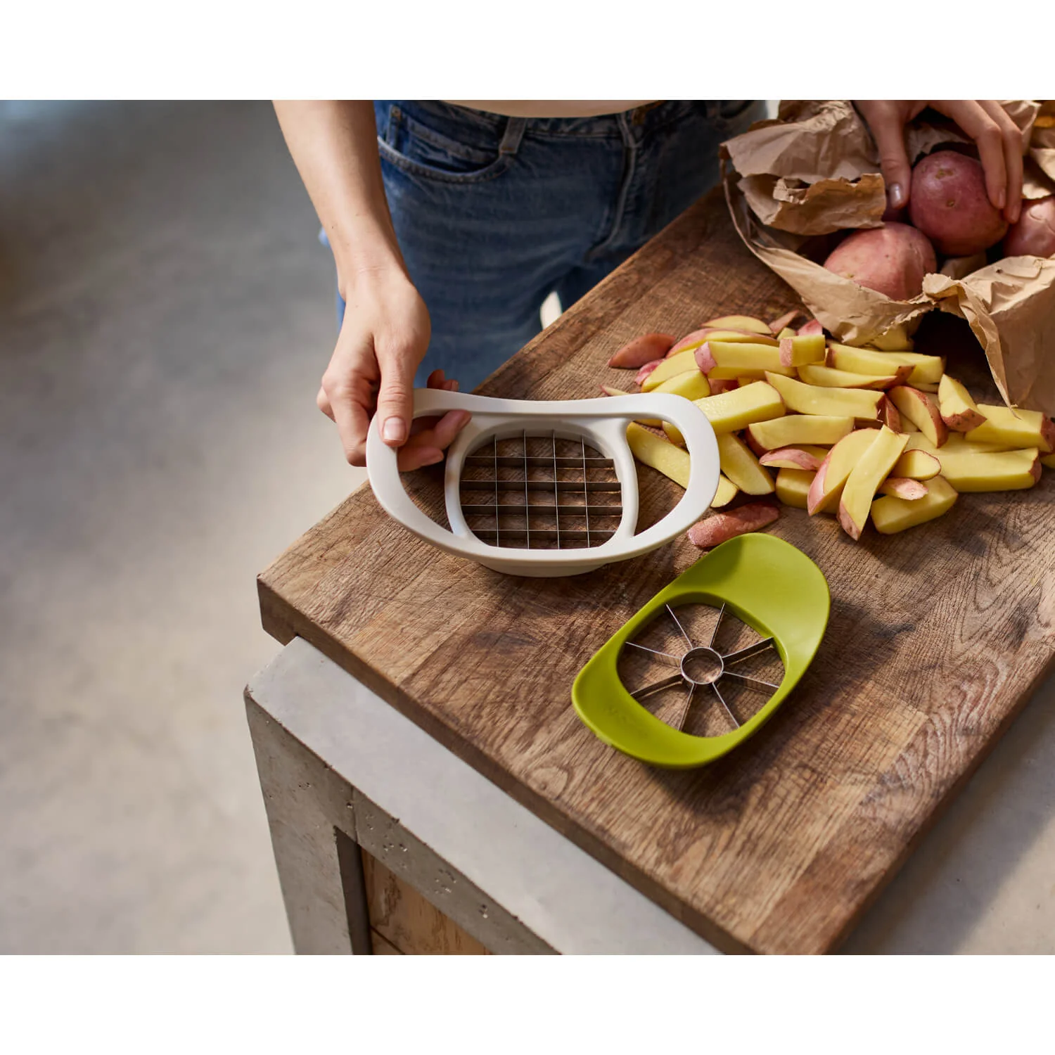 Joseph Joseph Nest™ Press 2-In-1 Fruit & Vegetable Cutter - Image 10